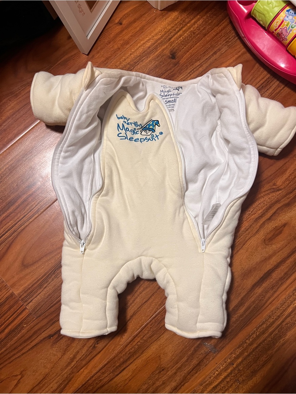 Baby Merlin Magic Sleep suit in yellow - Small